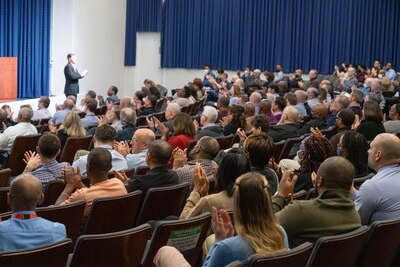 view of a full audience in an auditorium