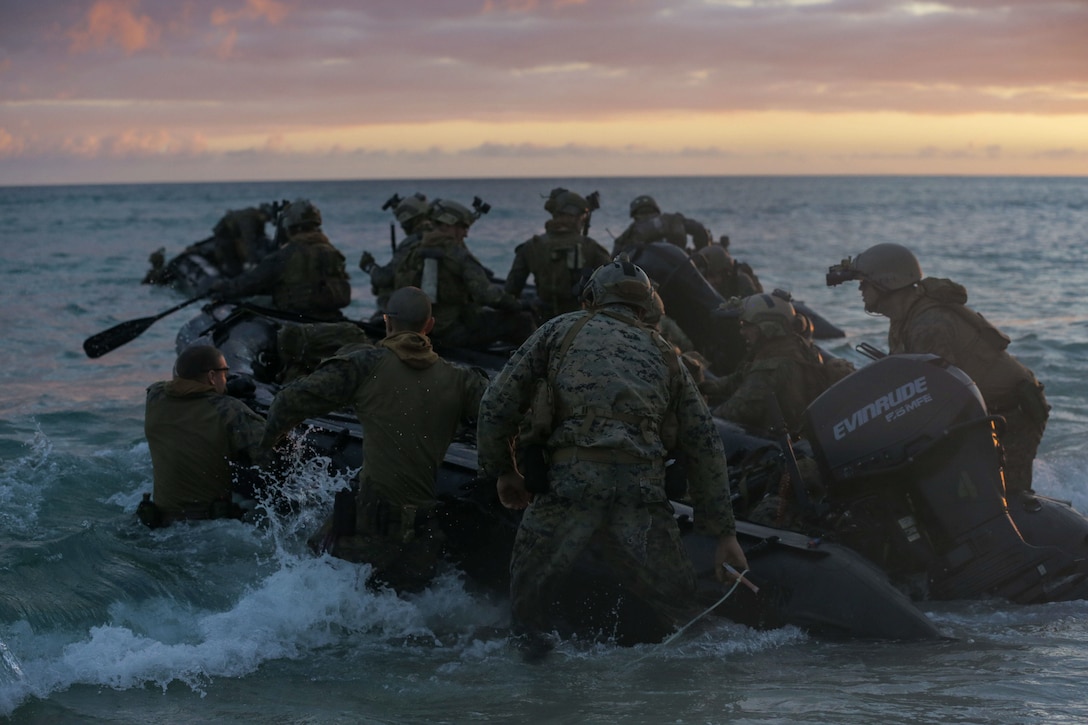 U.S. Marines with the 31st Marine Expeditionary Unit launch combat rubber raiding craft during a bottom-up visit, board, search, and seizure mission to intercept sensitive equipment during Realistic Urban Training Exercise 22.1 at Joint Base Pearl Harbor-Hickam, Hawaii, Jan 8, 2022. The purpose of the RUTEX is to incorporate the specialized individual and small-unit skills of the MEU and conduct high-intensity, advanced, and complex Marine Air-Ground Task Force operations to prepare MEUs and other designated forces to support the geographic combatant commanders.