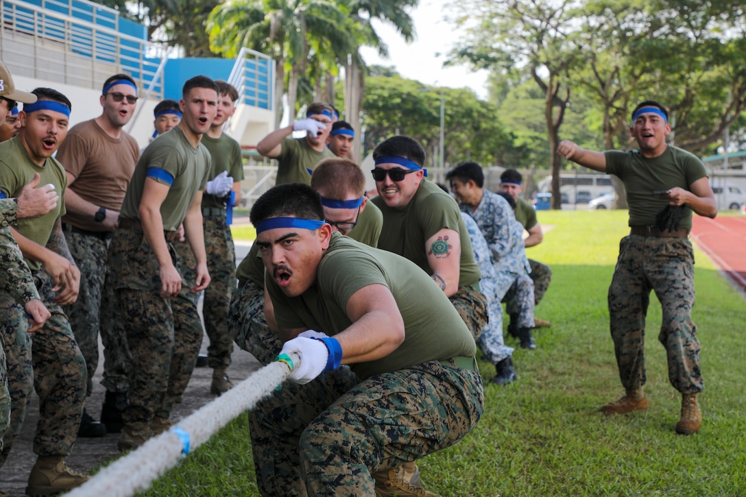 U.S. Marines with 13th Marine Expeditionary Unit and Sailors assigned to amphibious assault ship USS Makin Island participate in a tug-of-war competition alongside Republic of Singapore Navy sailors during Cooperation Afloat Readiness and Training /Marine Exercise Singapore 2022 sports day, Jan. 10. CARAT/MAREX Singapore is a bilateral exercise between Singapore and the United States designed to promote regional security cooperation, maintain and strengthen maritime partnerships, and enhance maritime cooperation. In its 28th year, the CARAT series is comprised of multinational exercises, designed to enhance U.S. and partner forces’ abilities to operate together in response to traditional and non-traditional maritime security challenges in the Indo-Pacific region.