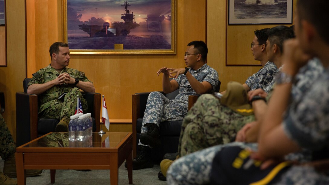 U.S. Navy Rear Adm. Mark A. Melson, commander of Task Force 76, speaks with a Republic of Singapore Navy admiral during a meeting to discuss Cooperation Afloat Readiness and Training/Marine Exercise Singapore, Jan. 9. CARAT/MAREX Singapore is a bilateral exercise between Singapore and the United States designed to promote regional security cooperation, maintain and strengthen maritime partnerships, and enhance maritime cooperation. In its 28th year, the CARAT series is comprised of multinational exercises, designed to enhance U.S. and partner forces’ abilities to operate together in response to traditional and non-traditional maritime security challenges in the Indo-Pacific region.