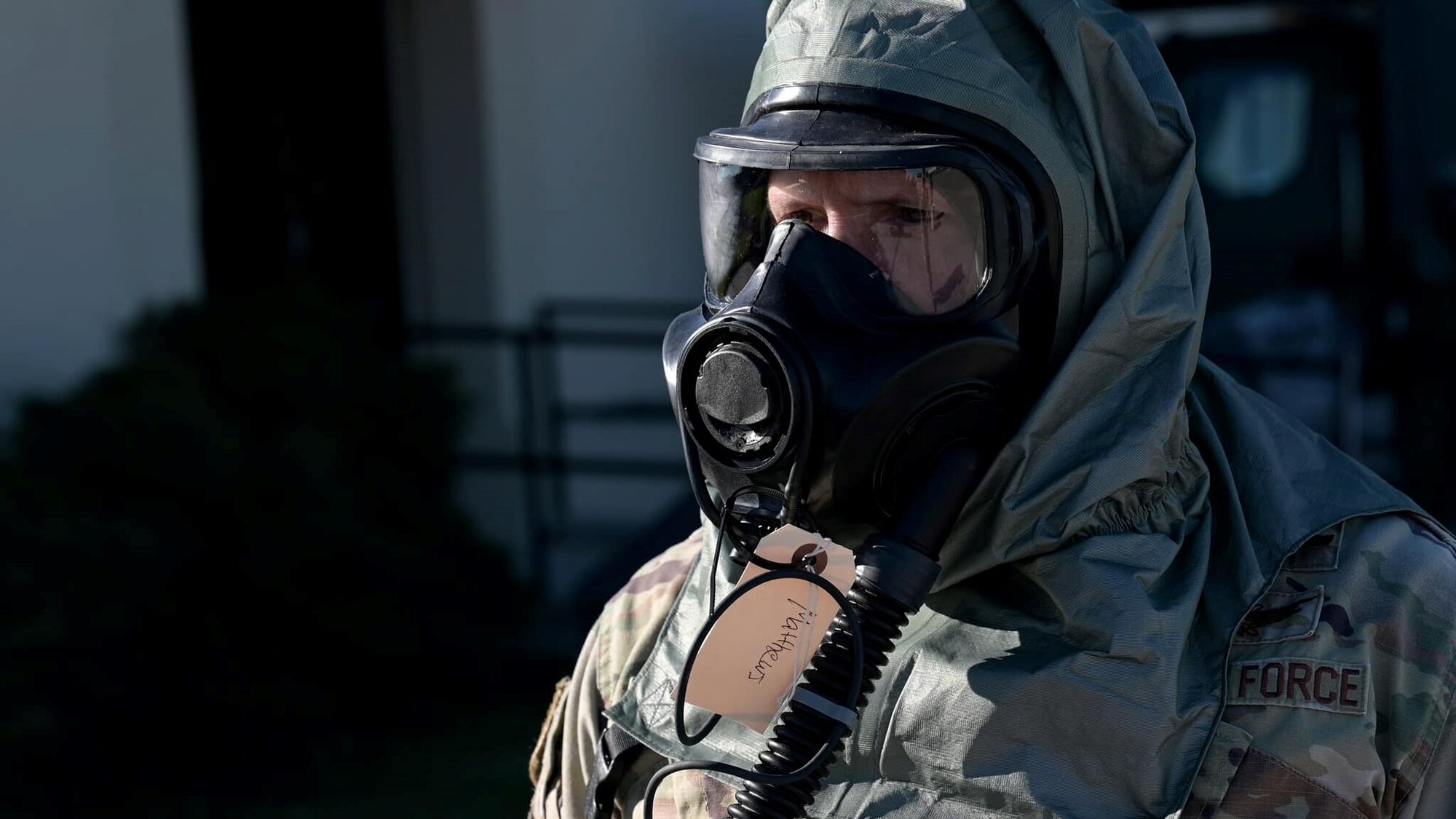 U.S. Air Force Col. Kurt Matthews, Commander, 927th Air Refueling Wing, MacDill Air Force Base, Fla., stands by for inspection and equipment removal during a decontamination line conducted by 927th Operations Support Squadron Aircrew Flight Equipment. Maintaining readiness is a top priority during the unit training assembly weekends for Reserve Airmen at the 927th ARW. (U.S. Air Force photo by Tech Sgt. Brad Tipton)