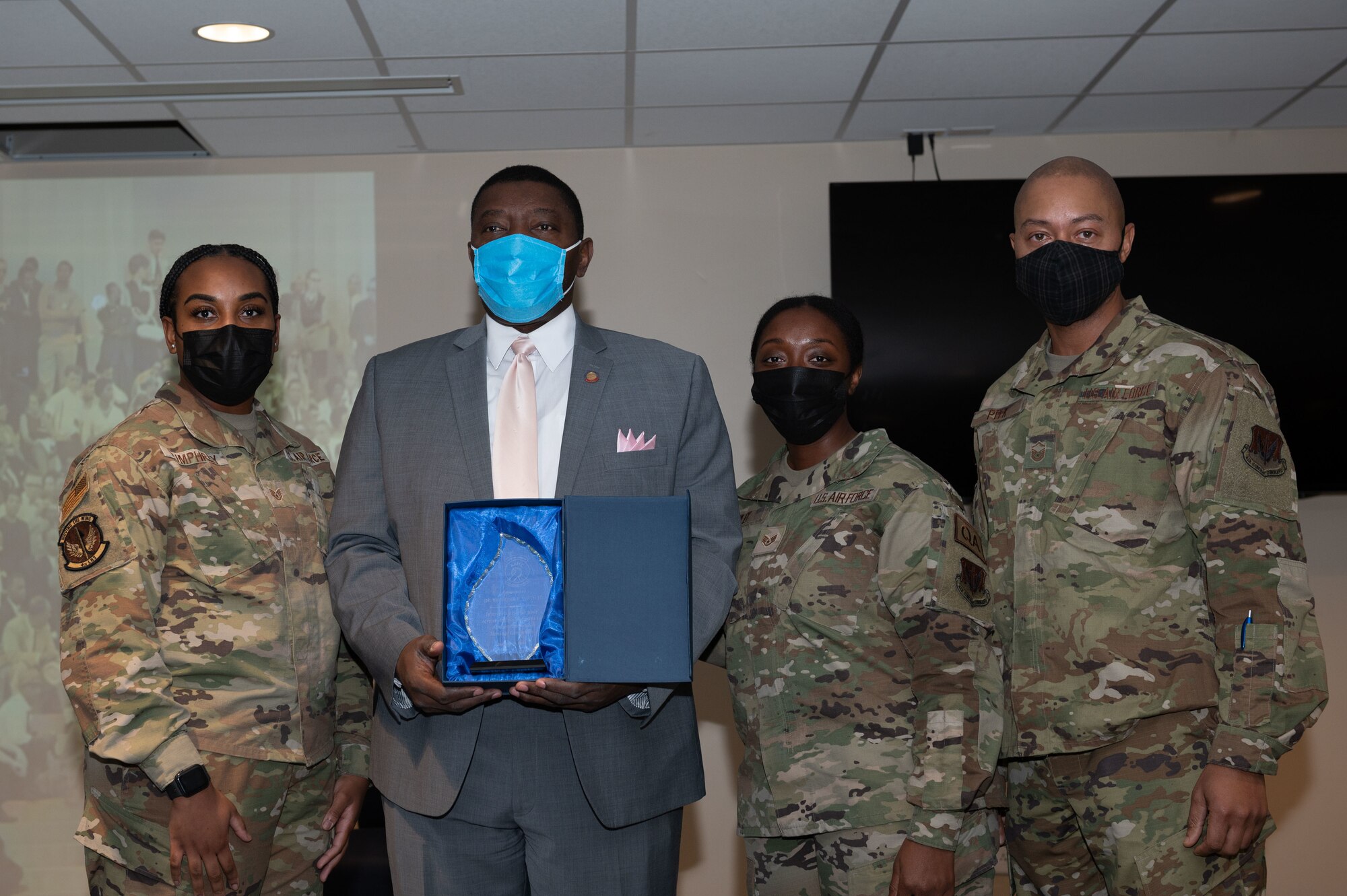 Dr. Raymond Smith, former North Carolina House of Representatives Minority Whip, receives a gift from the African American Heritage Committee after speaking during a Martin Luther King Jr. luncheon at Seymour Johnson Air Force Base, North Carolina, Jan. 13, 2023. The AAHC hosted the luncheon and the theme was “Remember! Celebrate! Act! A Day On, Not A Day Off!” (U.S. Air Force photo by Airman 1st Class Rebecca Sirimarco-Lang)