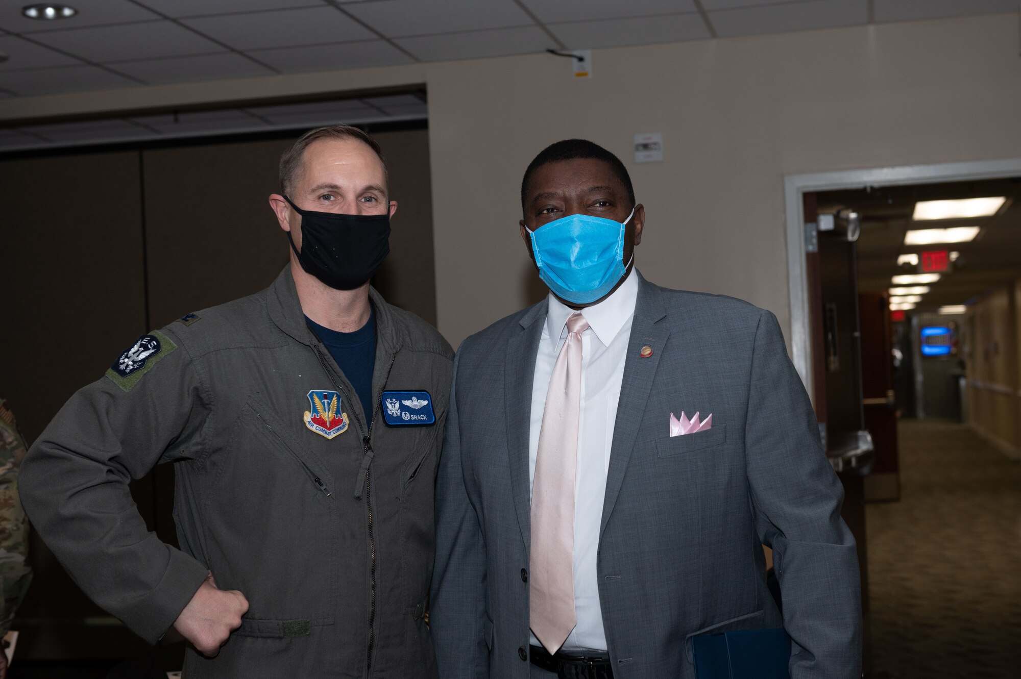 Col. Lucas Teel, 4th Fighter Wing Commander, left, and Dr. Raymond Smith, former North Carolina House of Representatives Minority Whip, right, pose for photo during a Martin Luther King Jr. luncheon at Seymour Johnson Air Base, North Carolina, Jan. 13, 2023. Martin Luther King Jr. Day is a federal holiday to honor the strides King took in advancing civil liberties for all Americans. (U.S. Air Force photo by Airman 1st Class Rebecca Sirimarco-Lang)