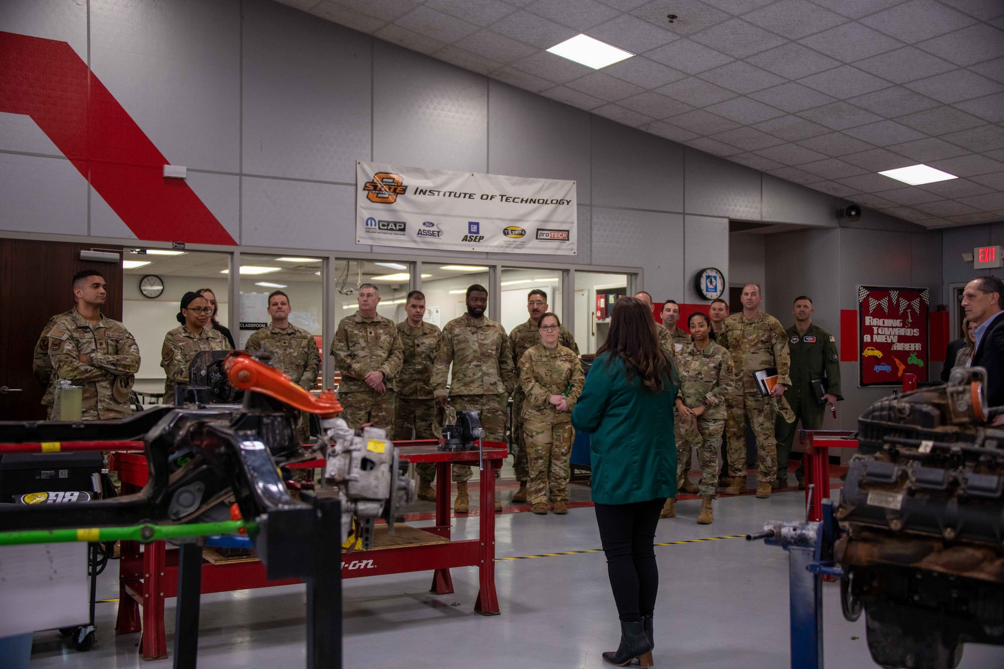 Jill Lazenby, marketing and communications director at Southwest Technology Center (SWTC),gives a tour to commanders and leadership from across Altus Air Force Base (AAFB),Oklahoma, Jan. 11, 2023. The partnership between AAFB and SWTC does not extend only to Airmen and civilian employees; family members and spouses are also encouraged to continue their education and further their career through SWTC. (U.S. Air Force photo by Airman 1stClass Kari Degraffenreed)