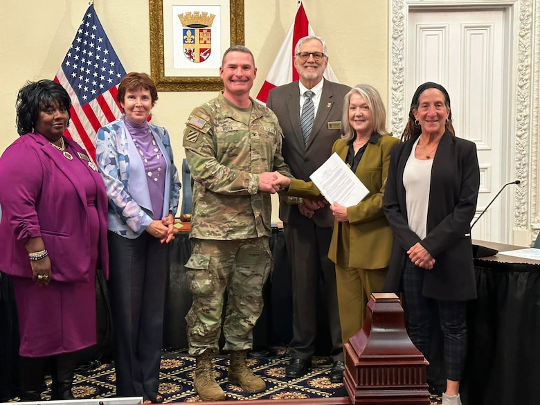 Left to Right) St. Augustine city Commissioner Cynthia Garris, Vice Mayor Roxanne Horvath, Col. James Booth, U.S. Army Corps of Engineers, Jacksonville District, commander, Commissioner Jim Springfield, Mayor Nancy Sikes-Kline and Commissioner Barbara Blonder celebrate the St. Augustine Back Bay CSRM Feasibility Study signing.