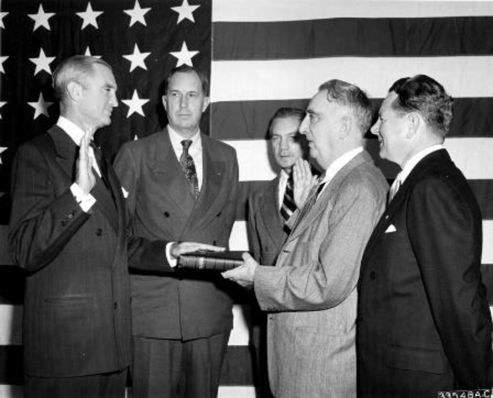 Stuart Symington takes the oath of office as Secretary of the Air Force from Chief Justice Fred 
Vinson. Left to right are Mr. Symington, Secretary of the Army Kenneth C. Royall; Secretary of 
Defense James N. Forrestal; Chief Justice Vinson; and Secretary of the Navy John L. Sullivan (U.S. Air Force photo)