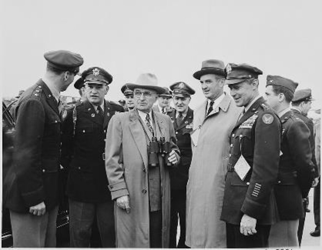 W. Stuart Symington, center right, first Secretary of the Air Force, from 1947 to 1950, joins President Harry Truman, center left, and a group of U.S. Air Force senior officers at Andrews Air Force Base in 1949. (National Archives photo)
