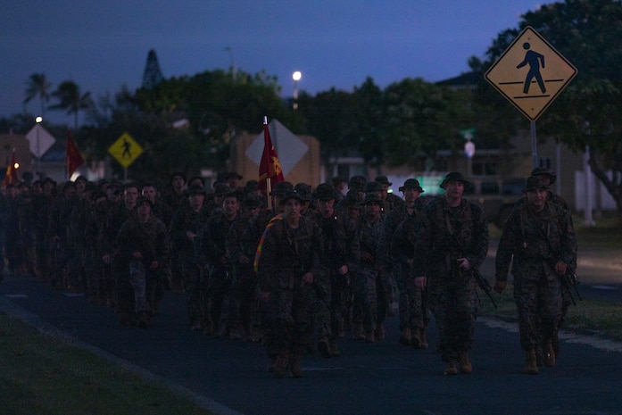 U.S. Marines with 3d Littoral Anti-Air Battalion conduct a 10 kilometer tactical march, Marine Corps Base Hawaii, Jan. 12, 2023. The purpose of the hike is to increase endurance, build upon the battalions’ physical capabilities and readiness, and ensure the battalion meets the prescribed quarterly requirements. (U.S. Marine Corps photo by Lance Cpl. Terry Stennett III)