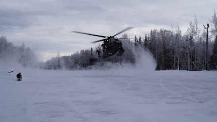 Special Tactics Airmen assigned to 24th Special Operations Wing, Detachment 1, conduct an aerial insertion and field training exercise at Camp Mad Bull training site on Joint Base Elmendorf-Richardson, Alaska, Jan. 10, 2023. The 24 SOW Det 1 Special Tactics Airmen are capable of assessing and opening anything from a major international airport to clandestine dirt strips in either permissive or hostile locations, providing strategic access for follow-on forces during global contingencies, and joint readiness exercises. Alaska Army National Guardsmen assigned to the 207th Aviation Battalion flew UH-60L and HH-60M Black Hawk helicopters in order to support the aerial insertion, medical evacuation and hoist training of the Special Tactics teams. The Alaska Army National Guard’s GSAB routinely trains with all branches of the military as well as civilian agencies to increase its operational interoperability and to be ready for a wide range of federal and state missions.