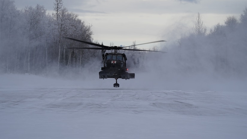 Special Tactics Airmen assigned to 24th Special Operations Wing, Detachment 1, conduct an aerial insertion and field training exercise at Camp Mad Bull training site on Joint Base Elmendorf-Richardson, Alaska, Jan. 10, 2023. The 24 SOW Det 1 Special Tactics Airmen are capable of assessing and opening anything from a major international airport to clandestine dirt strips in either permissive or hostile locations, providing strategic access for follow-on forces during global contingencies, and joint readiness exercises. Alaska Army National Guardsmen assigned to the 207th Aviation Battalion flew UH-60L and HH-60M Black Hawk helicopters in order to support the aerial insertion, medical evacuation and hoist training of the Special Tactics teams. The Alaska Army National Guard’s GSAB routinely trains with all branches of the military as well as civilian agencies to increase its operational interoperability and to be ready for a wide range of federal and state missions.