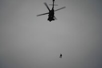 Special Tactics Airmen assigned to 24th Special Operations Wing, Detachment 1, conduct an aerial insertion and field training exercise at Camp Mad Bull training site on Joint Base Elmendorf-Richardson, Alaska, Jan. 10, 2023. The 24 SOW Det 1 Special Tactics Airmen are capable of assessing and opening anything from a major international airport to clandestine dirt strips in either permissive or hostile locations, providing strategic access for follow-on forces during global contingencies, and joint readiness exercises. Alaska Army National Guardsmen assigned to the 207th Aviation Battalion flew UH-60L and HH-60M Black Hawk helicopters in order to support the aerial insertion, medical evacuation and hoist training of the Special Tactics teams. The Alaska Army National Guard’s GSAB routinely trains with all branches of the military as well as civilian agencies to increase its operational interoperability and to be ready for a wide range of federal and state missions.
