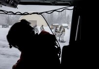 Special Tactics Airmen assigned to 24th Special Operations Wing, Detachment 1, conduct an aerial insertion and field training exercise at Camp Mad Bull training site on Joint Base Elmendorf-Richardson, Alaska, Jan. 10, 2023. The 24 SOW Det 1 Special Tactics Airmen are capable of assessing and opening anything from a major international airport to clandestine dirt strips in either permissive or hostile locations, providing strategic access for follow-on forces during global contingencies, and joint readiness exercises. Alaska Army National Guardsmen assigned to the 207th Aviation Battalion flew UH-60L and HH-60M Black Hawk helicopters in order to support the aerial insertion, medical evacuation and hoist training of the Special Tactics teams. The Alaska Army National Guard’s GSAB routinely trains with all branches of the military as well as civilian agencies to increase its operational interoperability and to be ready for a wide range of federal and state missions.