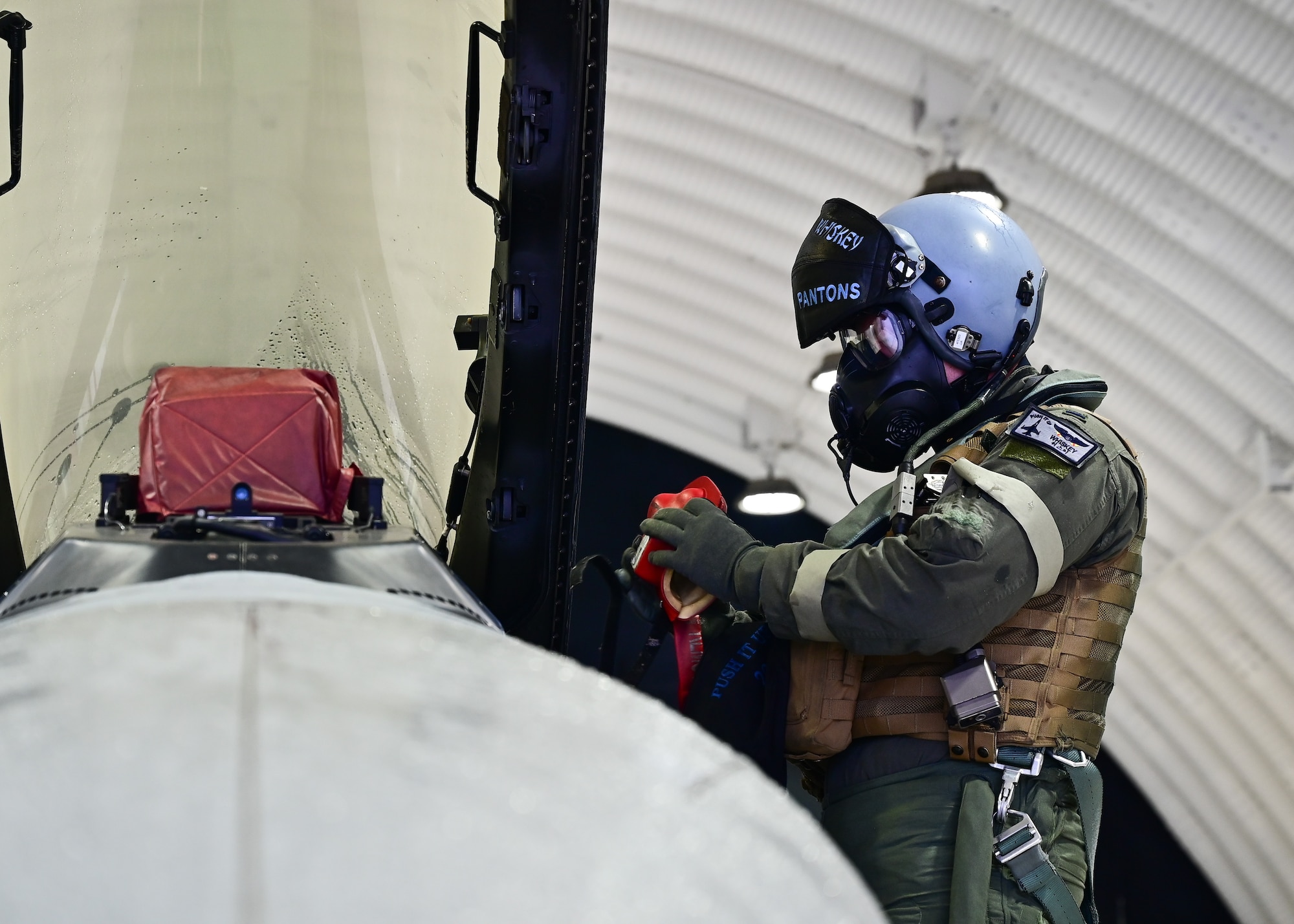 Pilot prepares to step into aircraft