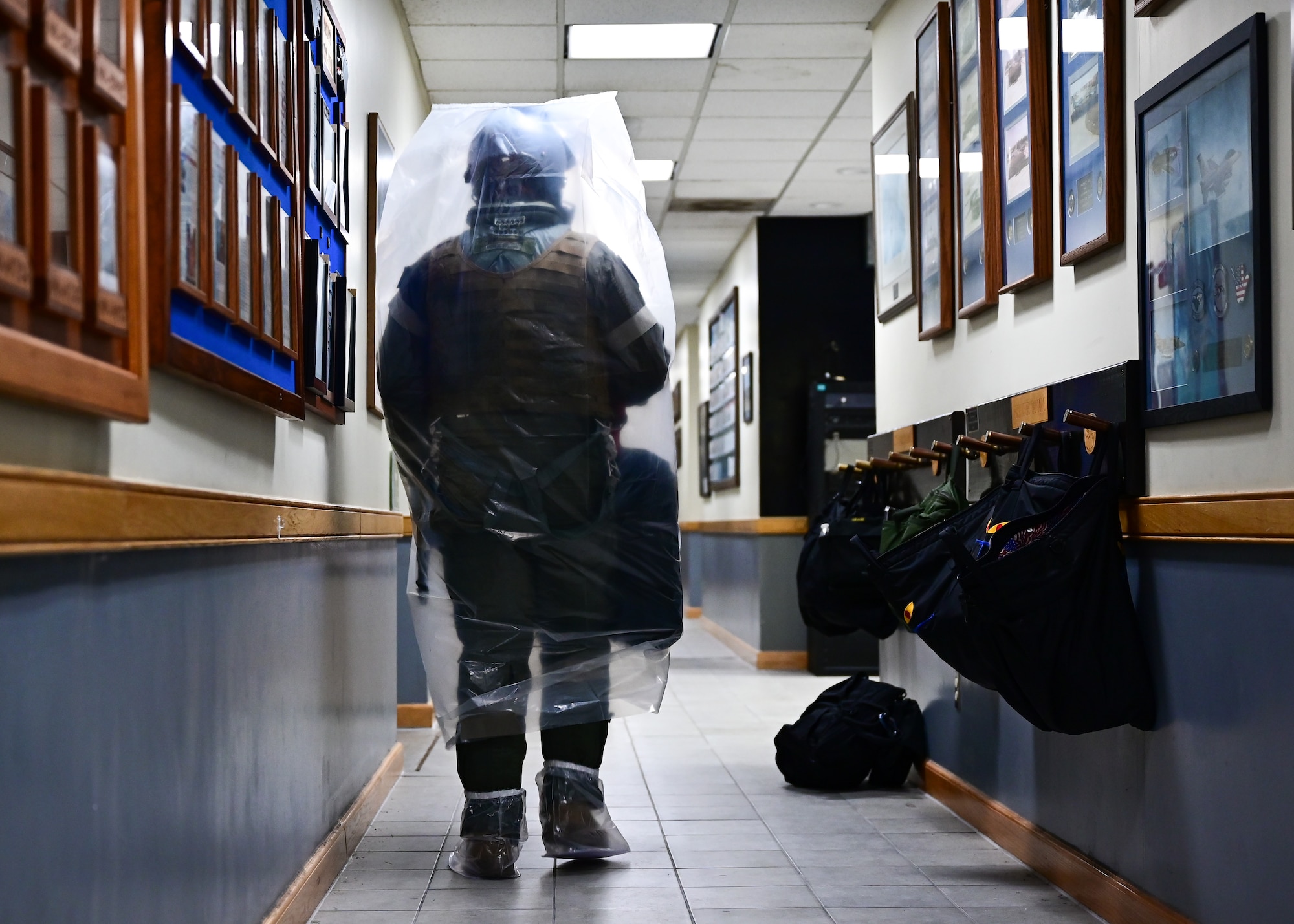 Pilot walks while wearing protective gear