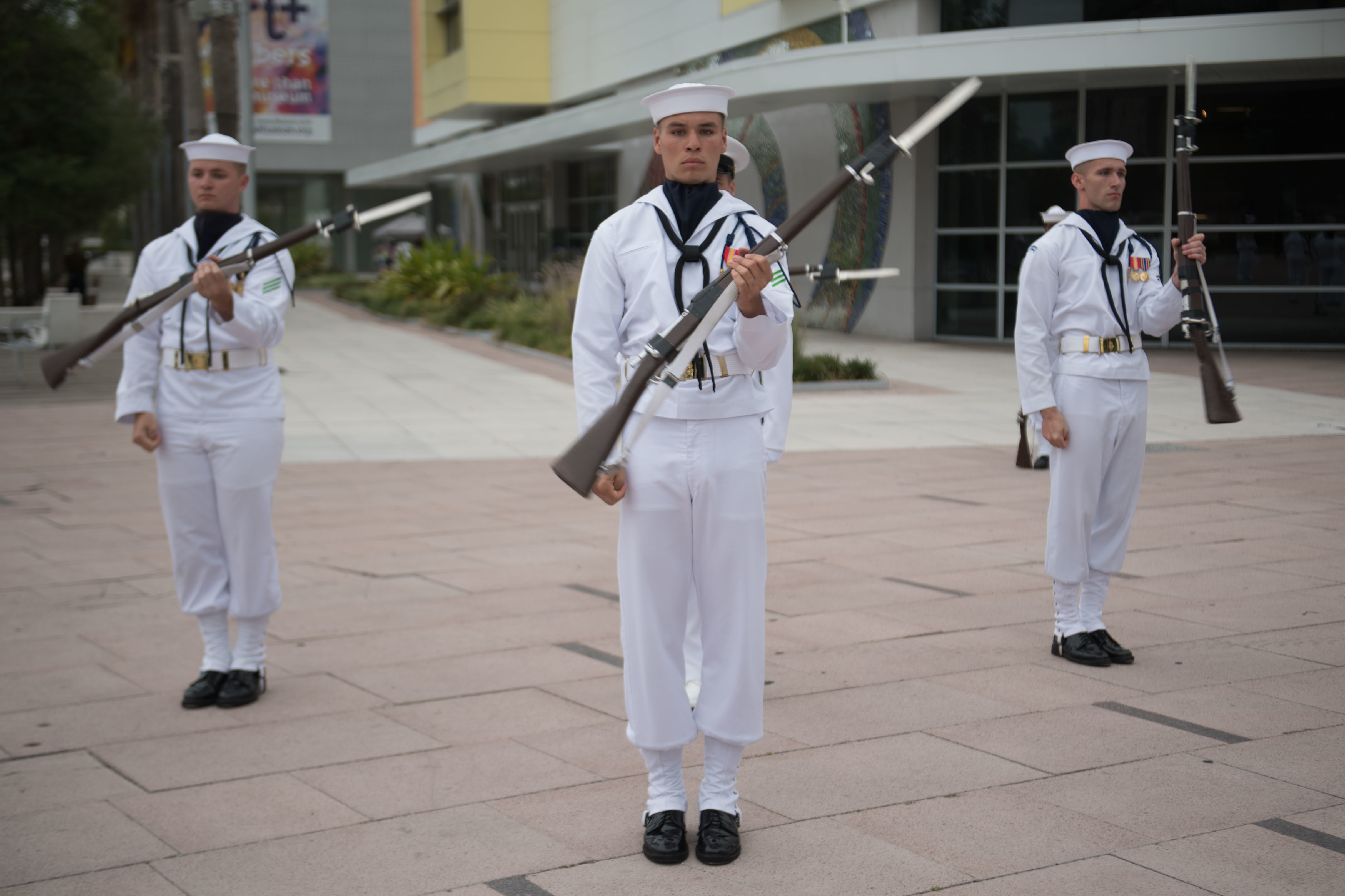 The U.S. Navy Ceremonial Guard drill team performs at the Glazer Children’s Museum in support of Tampa Bay Navy Week.