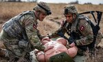 U.S. Army Sgt. Ethan Hart and Staff Sgt. Dylan Delamarter, 2nd Battalion, 108th Infantry, 27th Infantry Brigade Combat Team, New York National Guard, transport a casualty during the Army's Best Medic Competition at Fort Hood, Texas, Jan. 27, 2022. Twenty-two two-Soldier teams from around the world competed in the finals to be named the Army’s Best Medic.