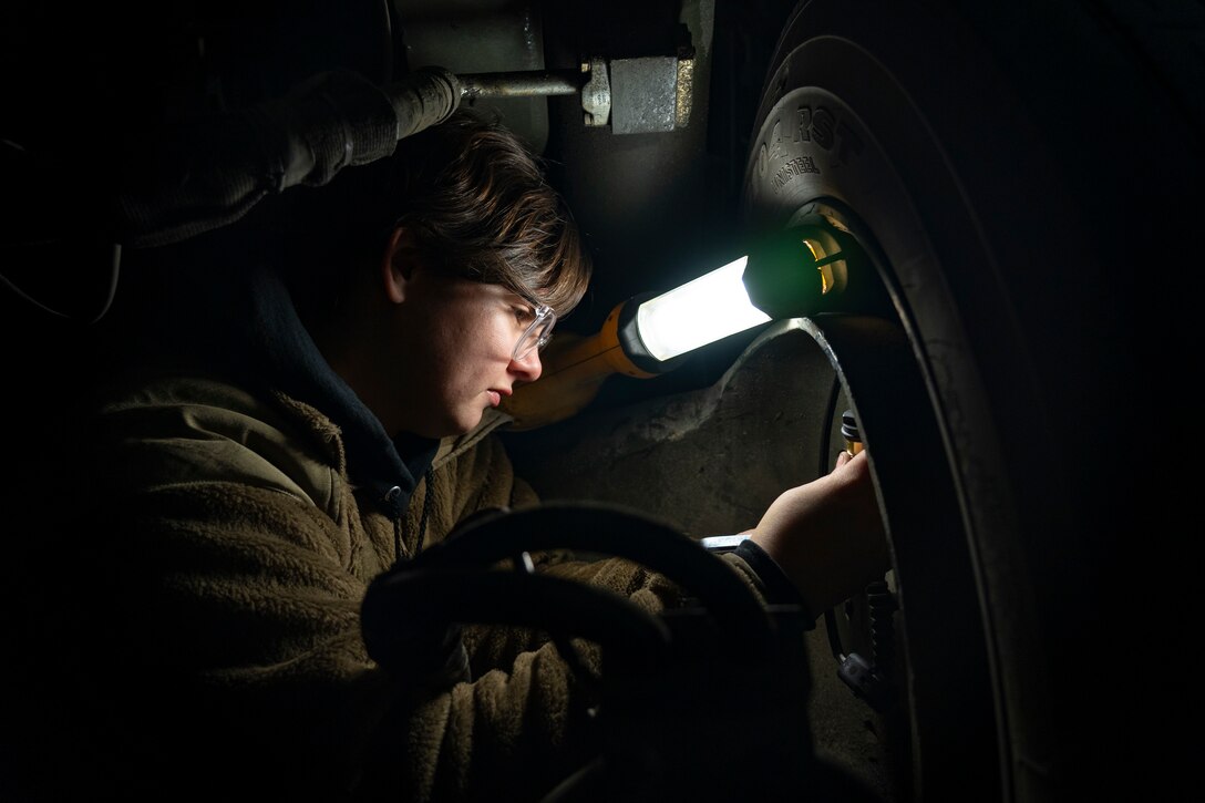 U.S. Air Force Senior Airman Jordan Cardona, a C Shred mechanic assigned to the 673d Logistics Readiness Squadron, repairs a 60k Cargo Loader wheel speed sensor at Joint Base Elmendorf Richardon, Alaska, Oct. 28, 2022.