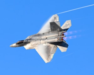 F-22 Raptor Demo team pilot flies during a practice flight