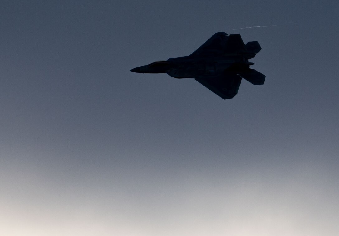 F-22 Raptor Demo team pilot flies during a practice flight