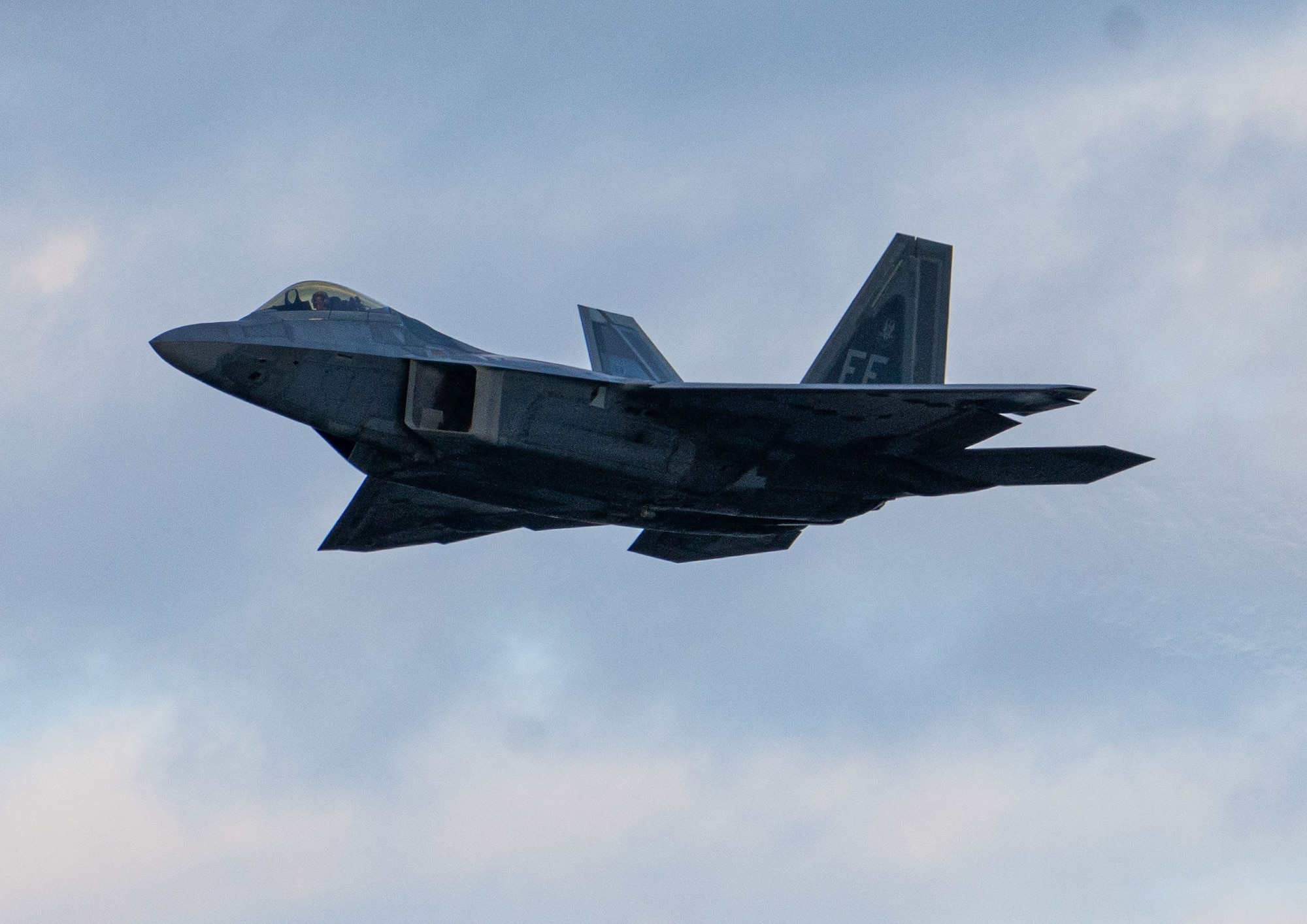 F-22 Raptor Demo team pilot flies during a practice flight