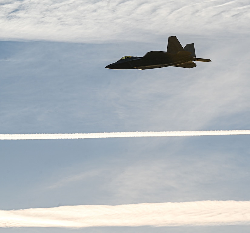 F-22 Raptor Demo team pilot flies during a practice flight