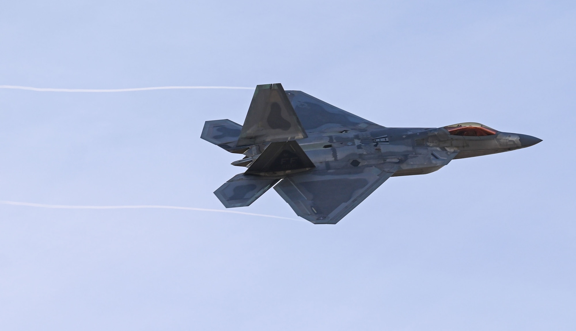 F-22 Raptor Demo team pilot flies during a practice flight