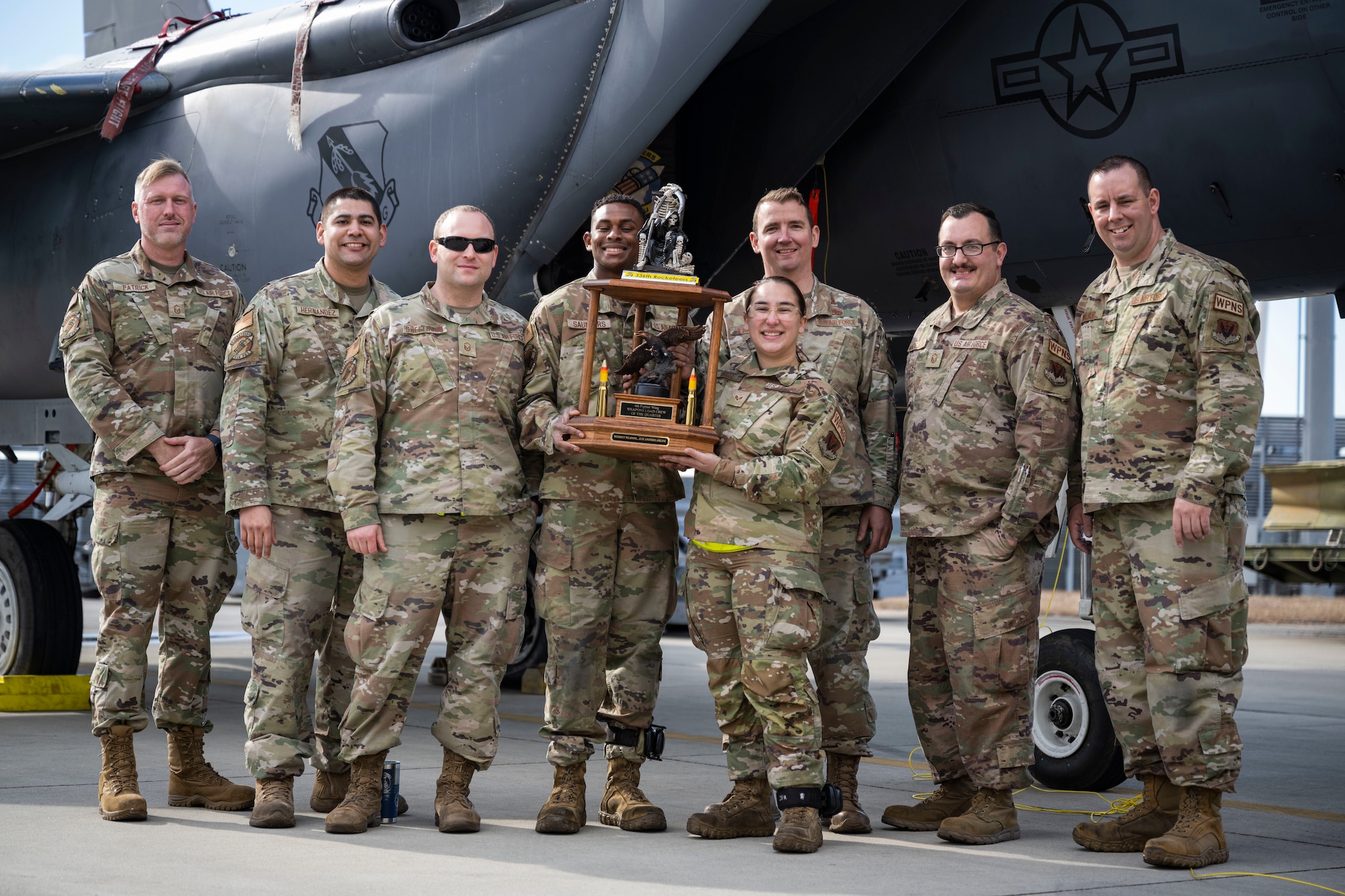Members assigned to the 336th Fighter Generation Squadron pose for a photo after winning the 4th Quarter Weapons Load Crew Competition at Seymour Johnson Air Force Base, North Carolina, Jan. 13, 2023. The 336th FGS completed weapons assembly and loading more accurately and efficiently than the other competitors.