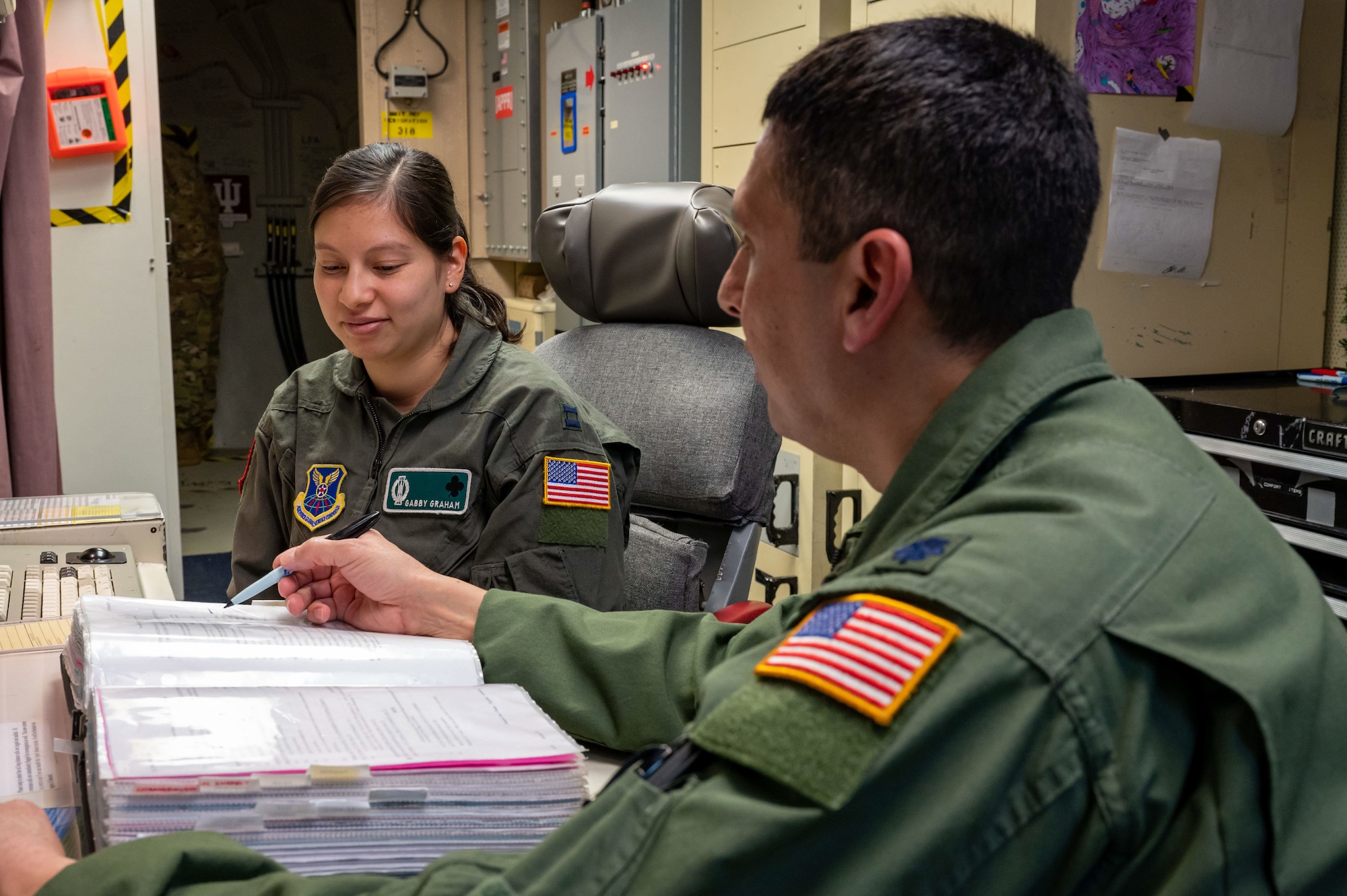 father and daughter missileers stand alert