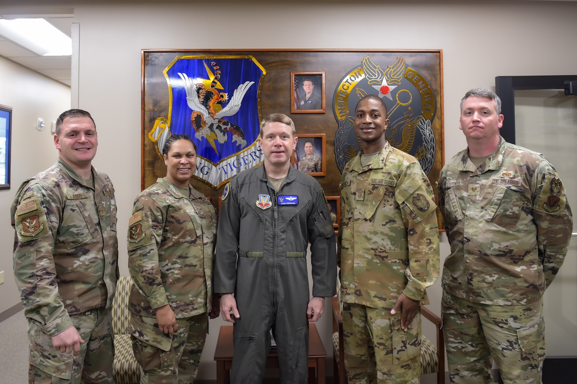 A photo of Airmen posing.