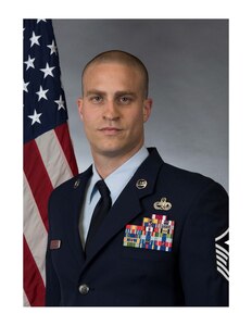 MSgt Matthew G Adelman bio photo (man in Air Force uniform)
