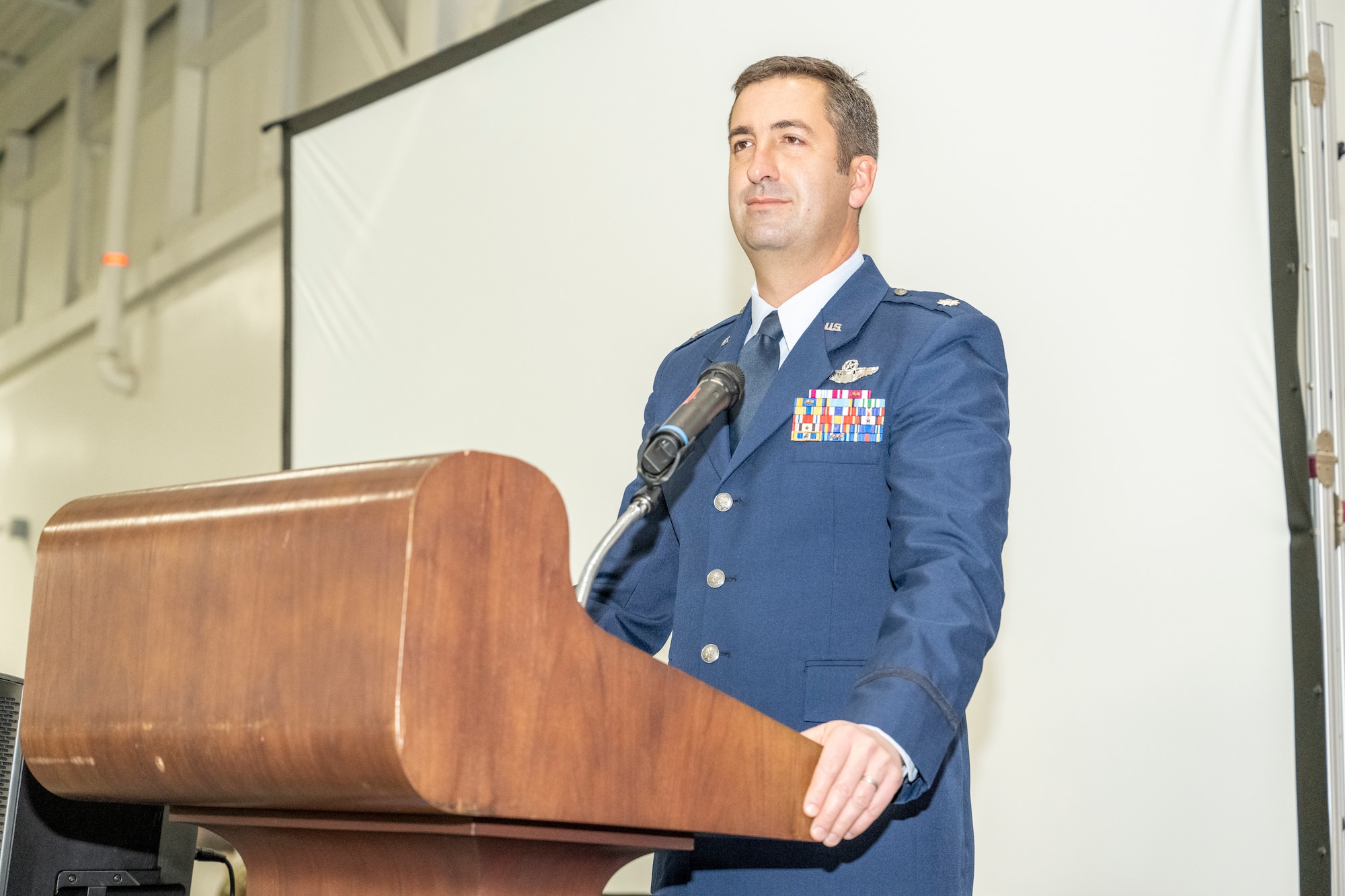 Lt. Col. D. Gifford Bloom, the new 721 Contingency Response Squadron (CRS) Commander, gives his first speech to his squadron and members in attendance for the 721st CRS Assumption of Command ceremony held at Travis Air Force Base, Calif., Jan. 12, 2023.
