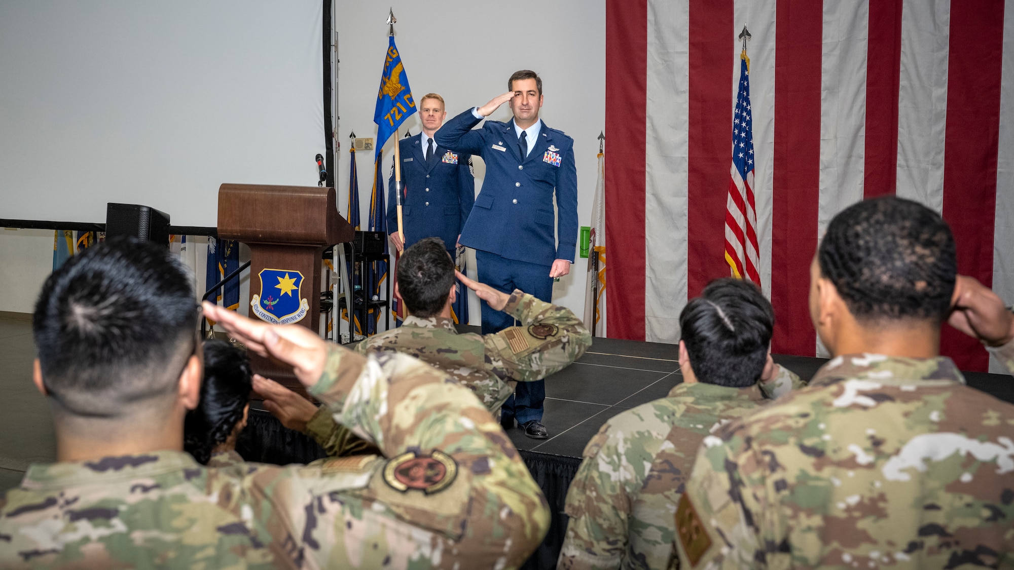 Lt. Col. D. Gifford Bloom, the new 721st Contingency Response Squadron Commander, renders his first salute to his squadron at Travis Air Force Base, Calif., Jan. 12, 2023.