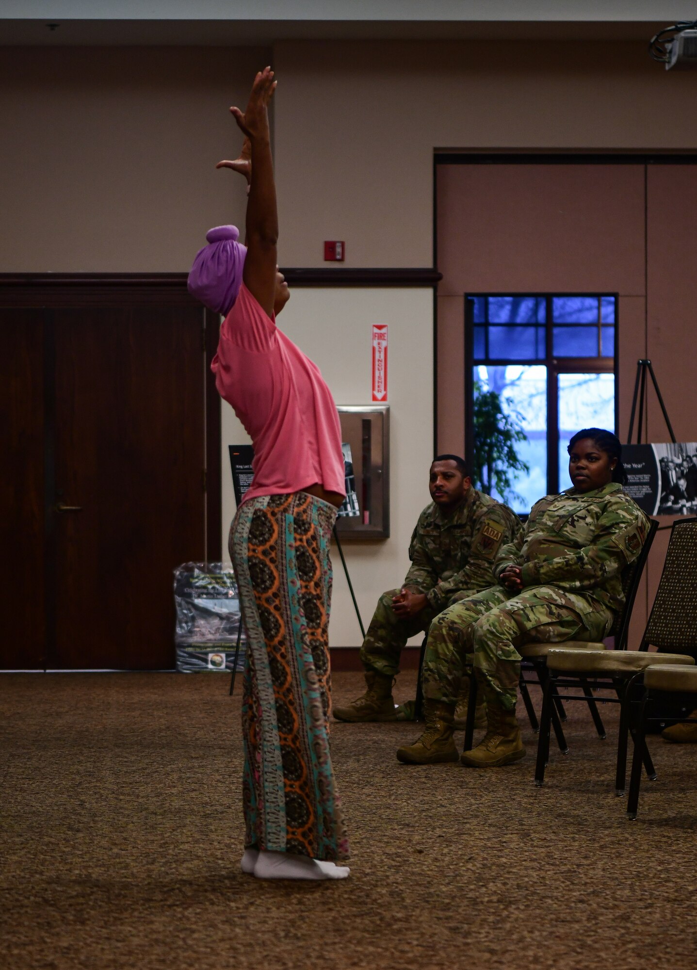 U.S. Air Force Tech. Sgt. Breona Calvert, 195th Intelligence Surveillance Reconnaissance Group personnel, performs a dance at the Recce Point Club on Beale Air Force Base on Jan 13, 2023.