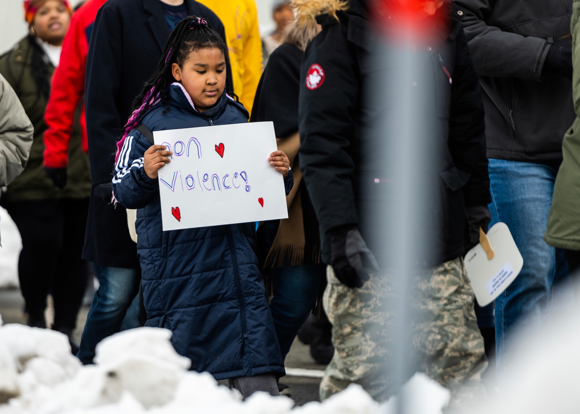 Members of Team Misawa imitate the Selma to Montgomery Mmarch in celebration of Martin Luther King, Jr. Day at Misawa Air Base, Japan, Jan. 16, 2023. Martin Luther King, Jr. Day is a federal holiday in the United States marking the birthday of Martin Luther King, Jr., the chief spokesperson for nonviolent activism in the Civil Rights Movement, which protested racial discrimination in federal and state law.