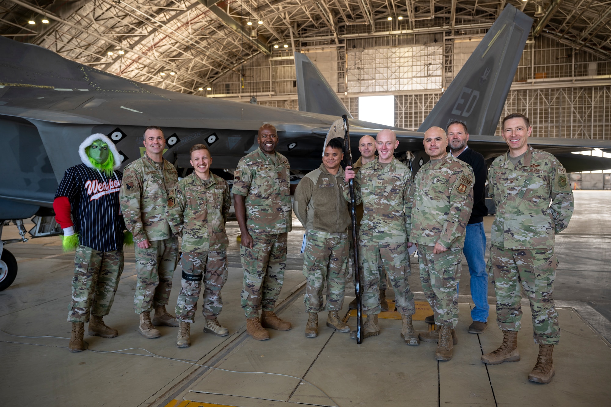 The 411th Raptor AMU wins the 3rd Quarter Weapons Load Crew of the Quarter Competition. (Pictured: Col. Matthew Caspers, Vice Commander, 412th Test Wing, Col. Ahave Brown, Commander, 412th Maintenance Group)
