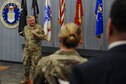 Gen. Glen VanHerck, Commander, North American Aerospace Defense Command and U.S. Northern Command, answers questions from National Air and Space Intelligence Center staff following a coining presentation in the NASIC Forum at Wright-Patterson Air Force Base, Ohio, Jan. 11, 2023. VanHerck coined three individuals from NASIC for their exemplary performance.