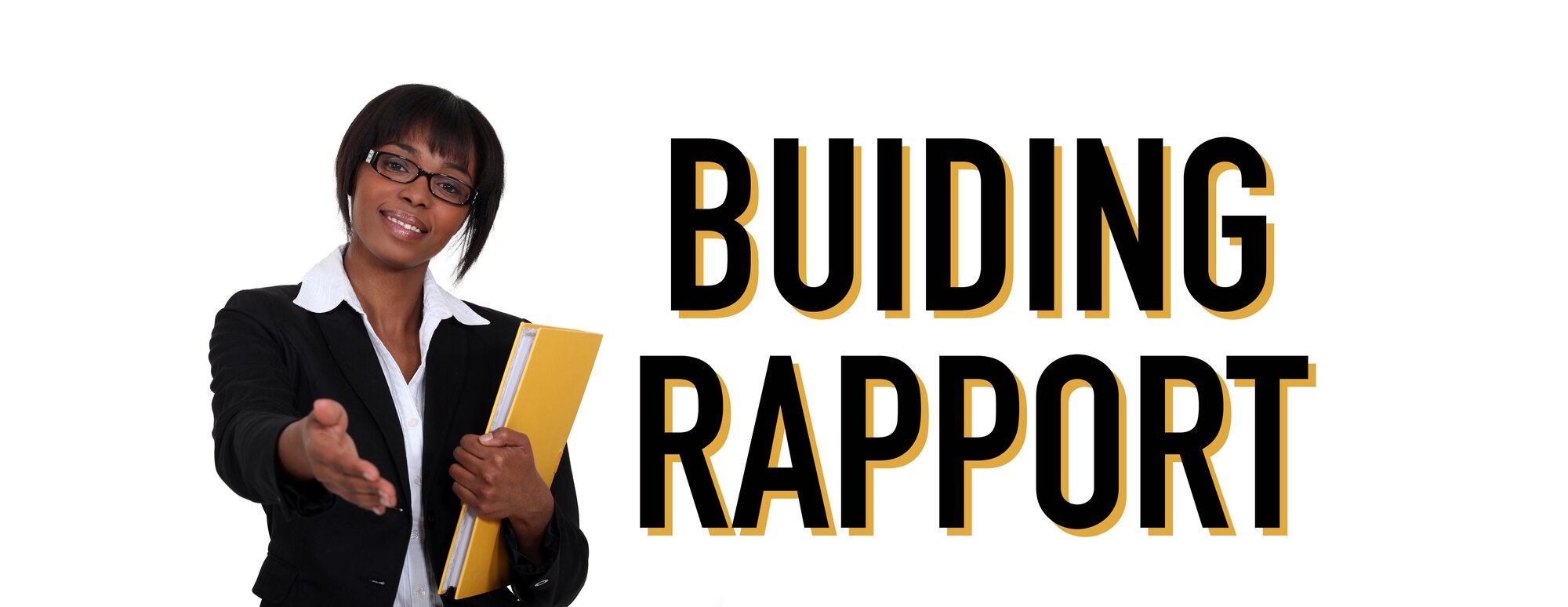 Woman in business suit with warm smile and outstretched hand in greeting