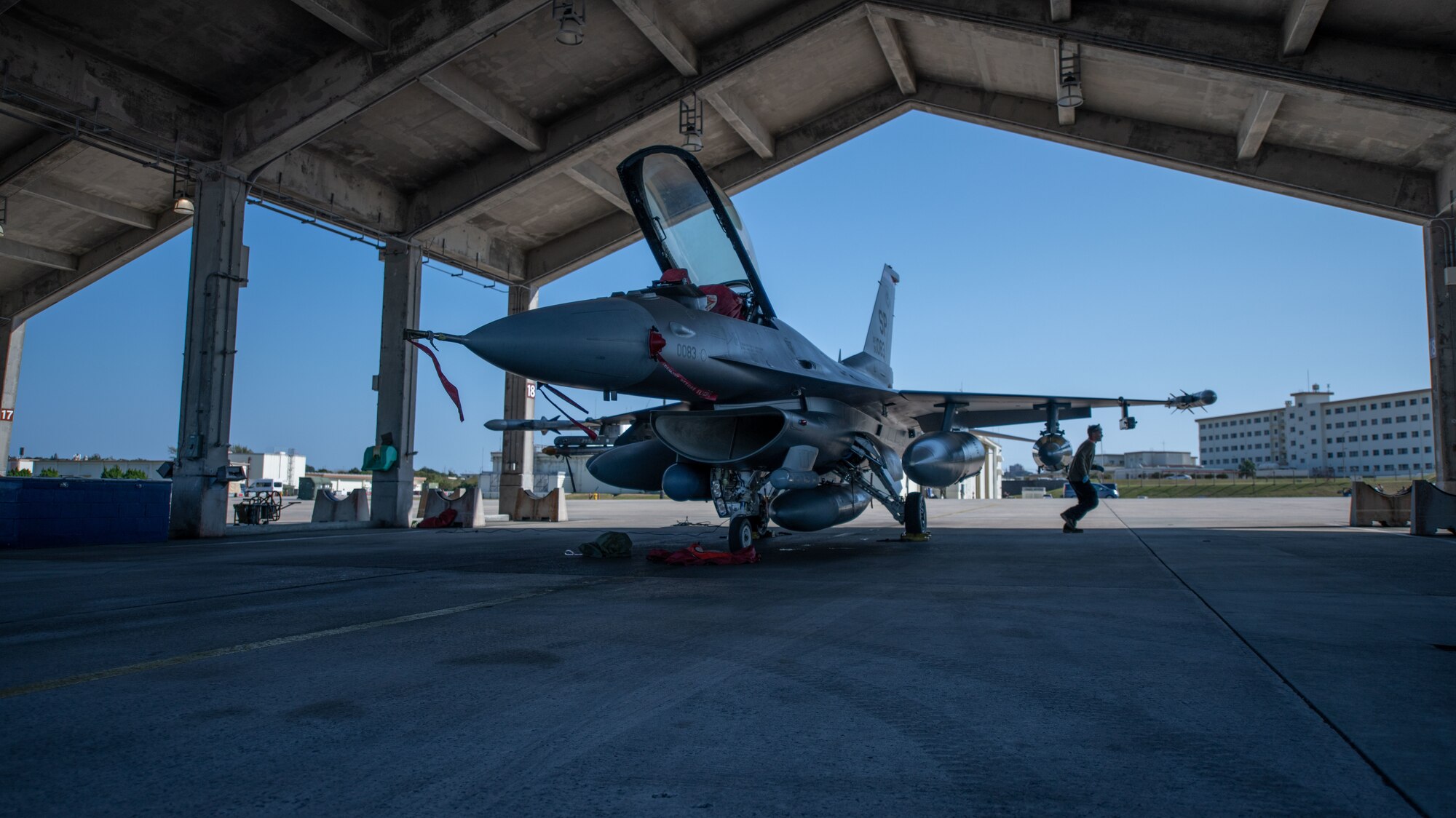 An Airman inspects a jet.