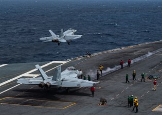 USS Nimitz (CVN 68) conducts flight operations in the South China Sea.