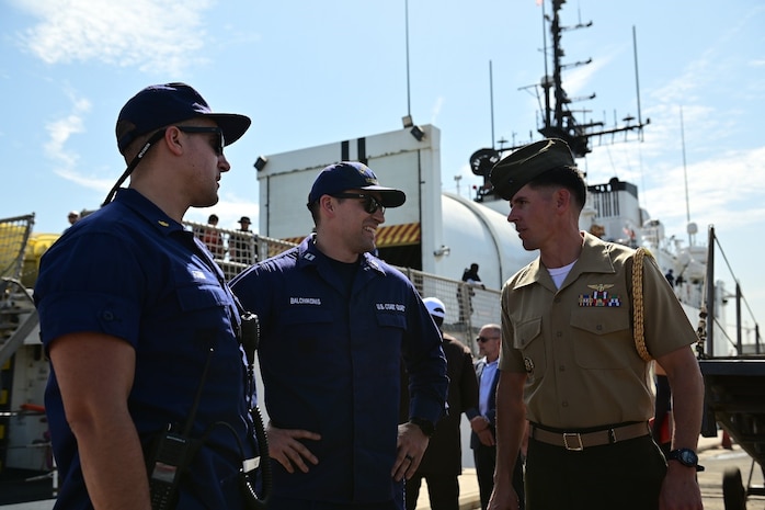 U.S. Coast Guard Lt. Cmdr. Nicholas Forni, executive officer aboard USCGC Spencer (WMEC 905) and Lt. Jacob Balchikonis, operations officer aboard Spencer, meet with Lt. Col. Sam Kunst, U.S. Marine Corps Attaché to Dakar, Senegal, Jan. 17, 2023. Spencer is on a scheduled deployment in the U.S. Naval Forces Africa area of responsibility, employed by the U.S. Sixth Fleet, to carry out joint training, exercises, and maritime security operations alongside AFRICOM partners in support of U.S. interests abroad, regional partnerships, and to strengthen international maritime governance. (U.S. Coast Guard photo by Petty Officer 3rd Class Mikaela McGee)