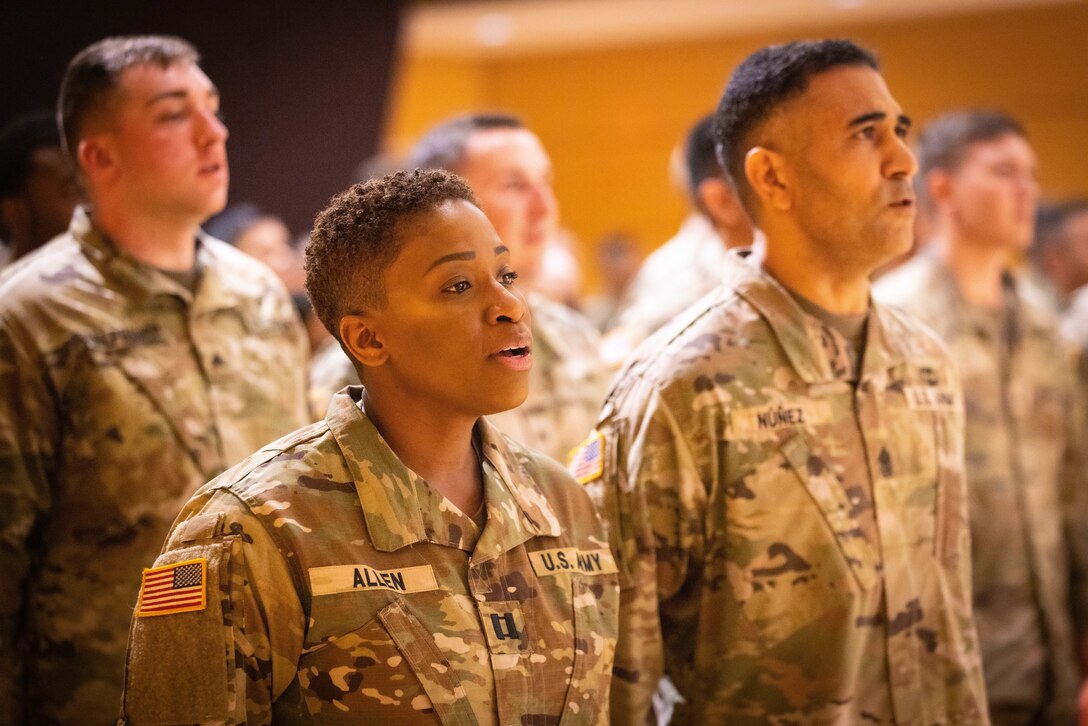 Capt. Allen and 1st Sgt Nunez sing the Army Song.