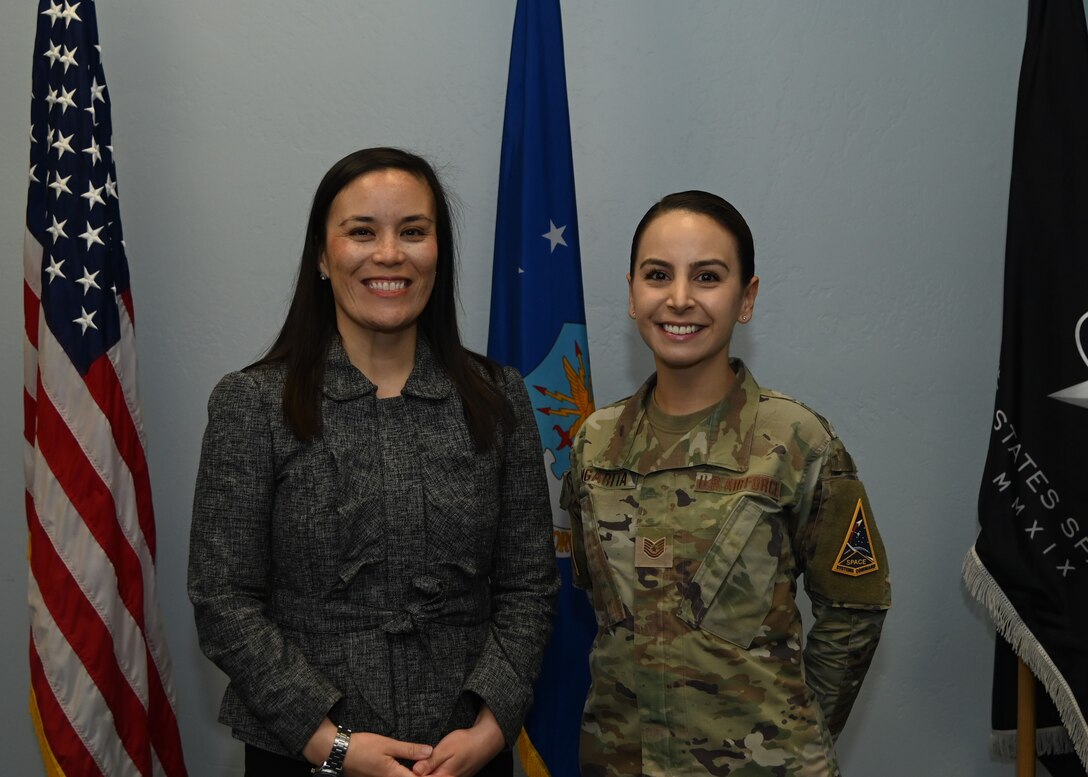 During her visit to Vandenberg Space Force Base, Calif., Dec. 2, 2022, Under Secretary of the Air Force, Gina Ortiz Jones, met and congratulated Tech. Sgt. Aly Angarita, one of 19 Airmen selected for Fiscal Year 2023’s Senior Enlisted Commissioning Program-Officer Training School. The SLECP-O allows senior Air Force leaders to directly select outstanding enlisted Airmen for commissioning through OTS. Angarita, the executive assistant to the Space Launch Delta 30 Senior Enlisted Airman, departs in March for OTS at Maxwell Air Force Base, Ala. (U.S. Space Force Photo by Airman 1st Class Ryan Quijas)