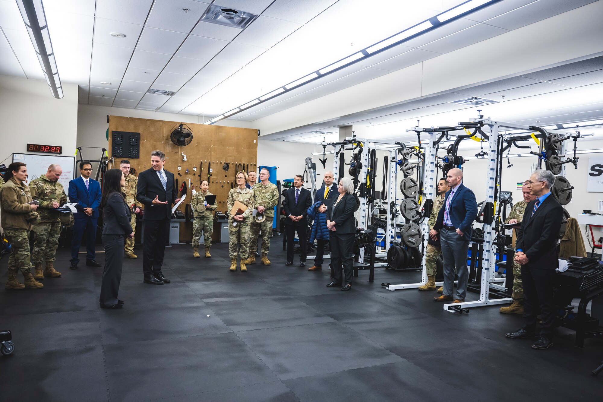 Dr. James Christensen, the 711th Human Performance Wing’s Biotechnology for Performance Research and Demonstration Product Line lead, briefs Undersecretary of the Air Force Gina Ortiz Jones on the Signature Tracking for Optimized Nutrition and Training Laboratory during her Jan. 9 visit to Wright-Patterson Air Force Base, Ohio.