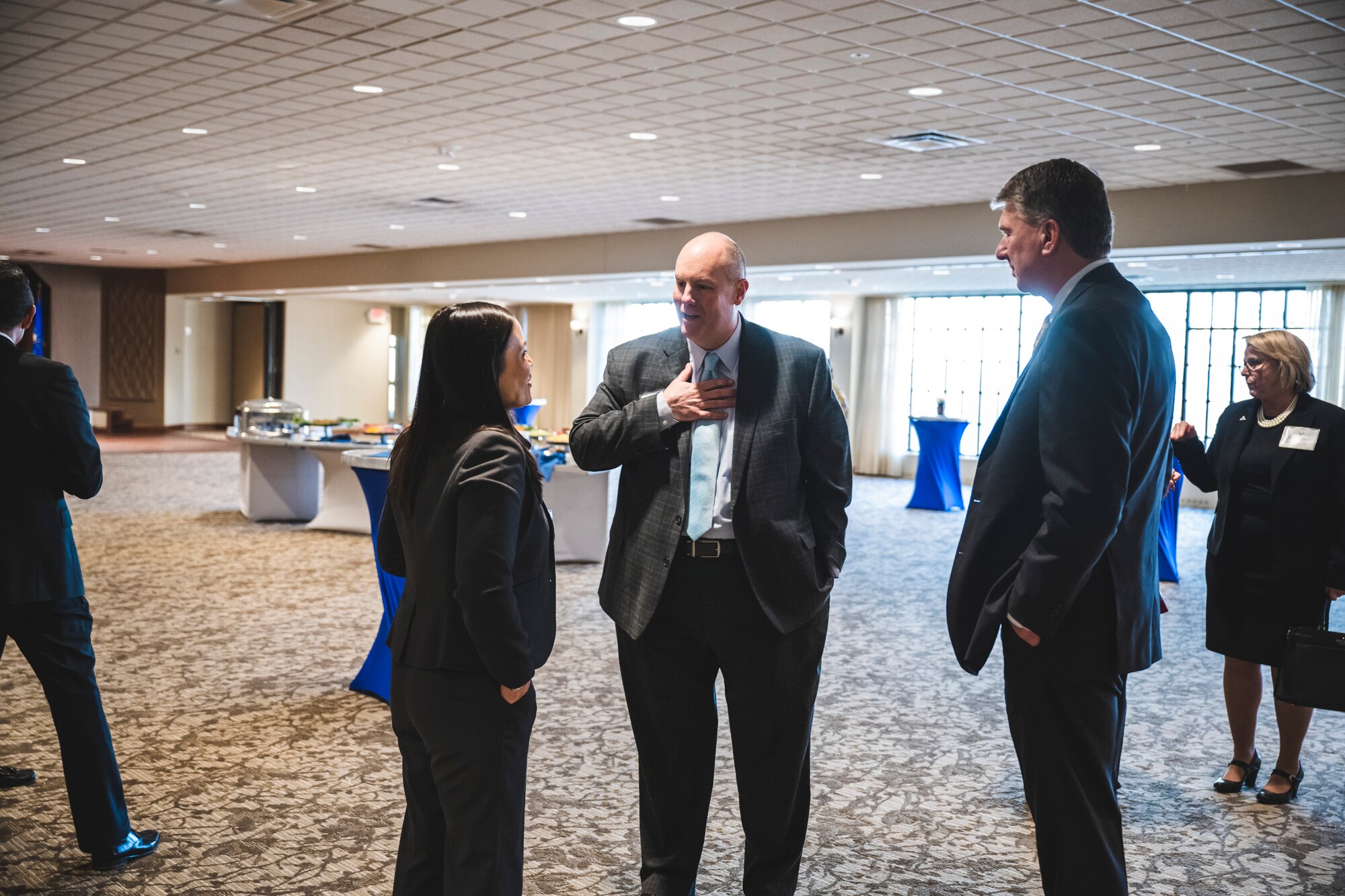 Christopher Kershner (center), Dayton Area Chamber of Commerce president, chats with Undersecretary of the Air Force Gina Ortiz Jones during a reception and social Jan. 9 at Wright-Patterson Air Force Base, Ohio.