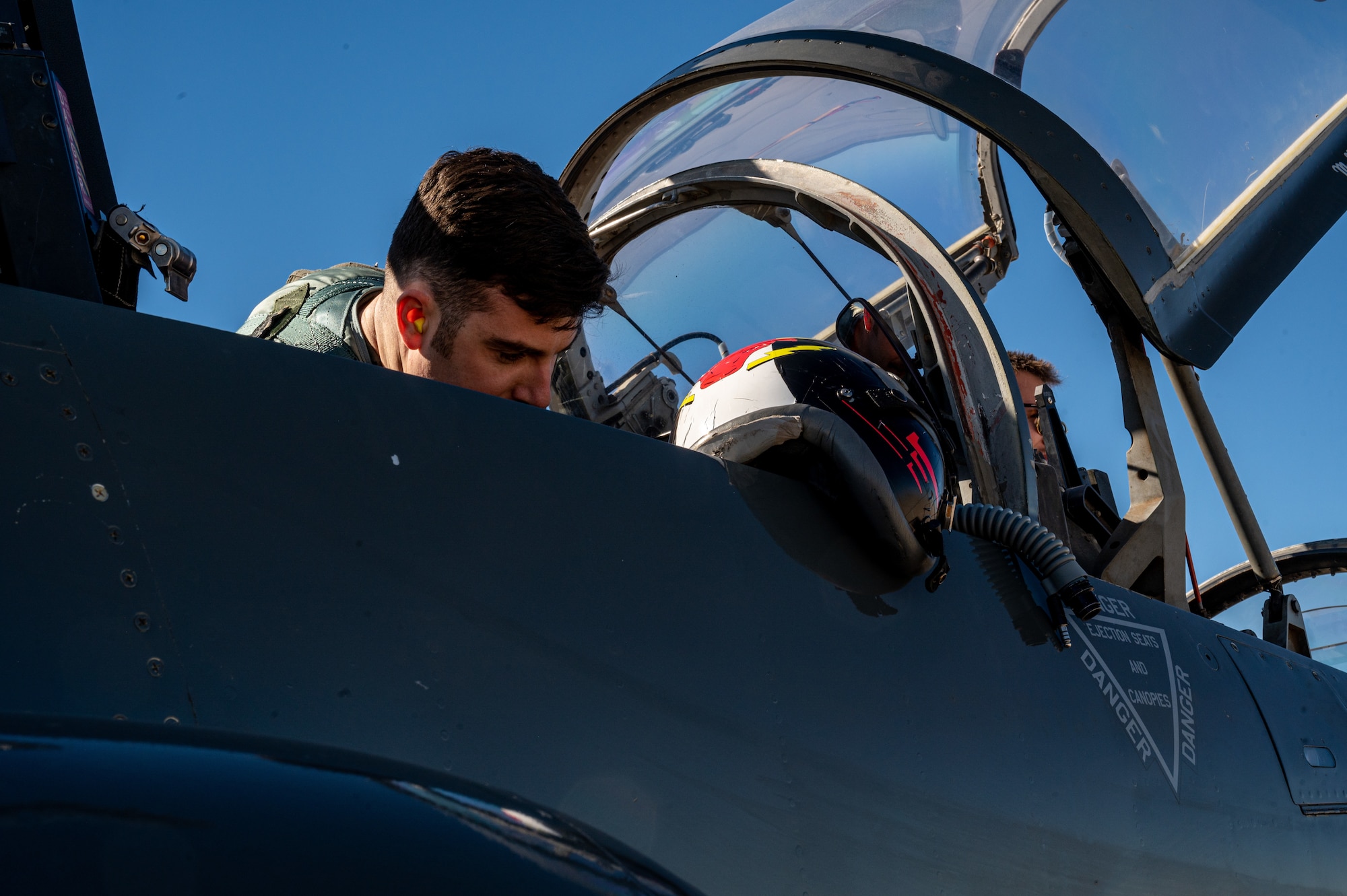 U.S. Air Force Capt. Garrett Green, 87th Flying Training Wing performs his pre-flight inspections before a standard cross country with students to hone their skills on Jan. 13, 2023, Laughlin Air Force Base, Texas. Cross country missions have students fly to different locations over the course of several days, to gain a large amount of flying time and test what they have learned. (U.S. Air Force photo by Senior Airman David Phaff)