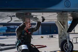 U.S. Air Force Capt. Garrett Green, 87th Flying Training Squadron, instructor pilot, performs his pre-flight inspections before a standard cross country with students to hone their skills on Jan. 13, 2023, at Laughlin Air Force Base, Texas. Cross country missions have students fly to different locations over the course of several days, to gain a large amount of flying time and test what they have learned. (U.S. Air Force photo by Senior Airman David Phaff)
