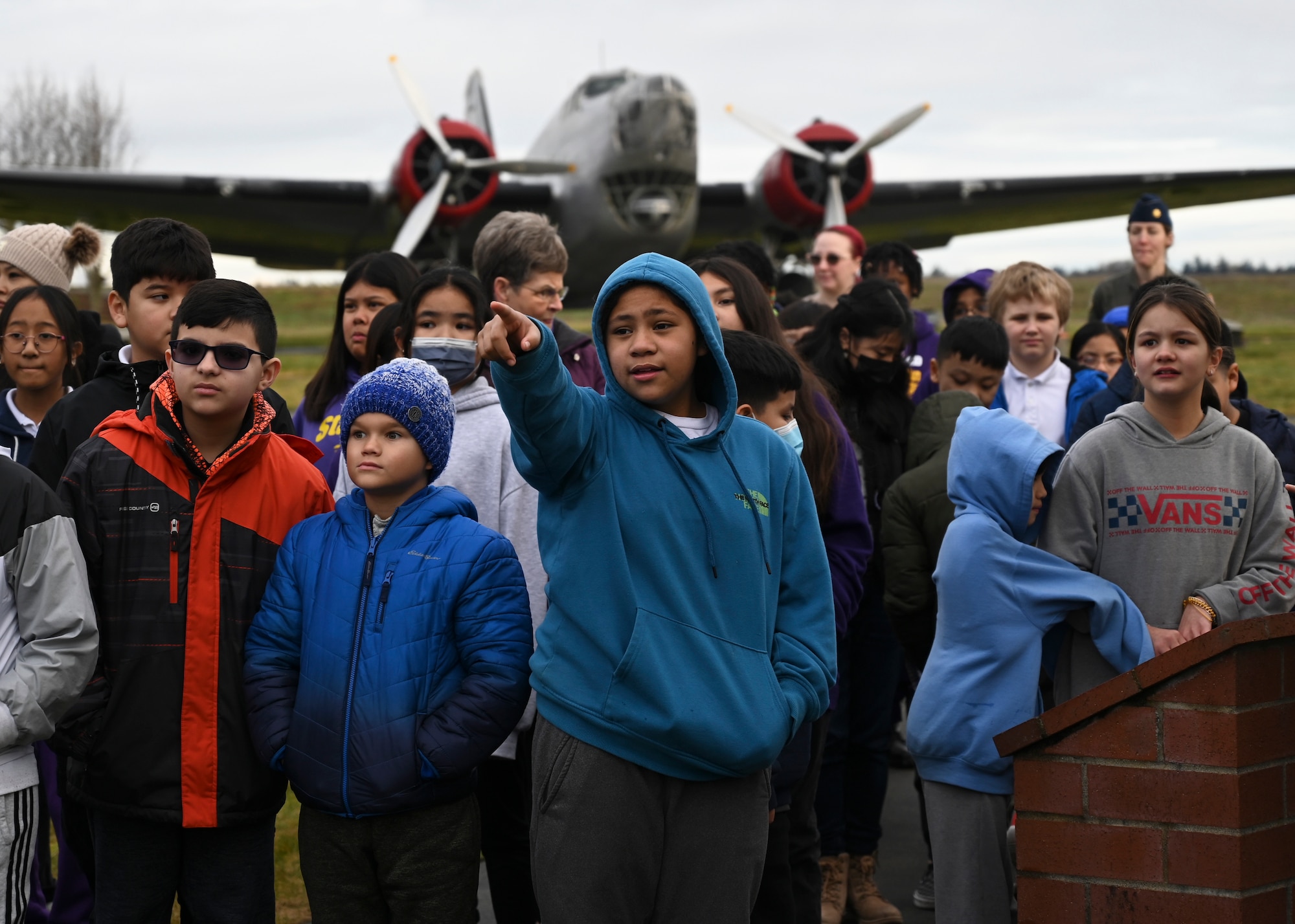 Students from Stafford Elementary School, Tacoma, tour Heritage Hill Airpark during an Aviation Inspiration and Mentorship (AIM) event at Joint Base Lewis-McChord, Washington, Jan. 17, 2023. AIM is a community outreach program that is designed to inform, influence and inspire the next generation of Air Force aviators. (U.S. Air Force photo by Senior Airman Callie Norton)