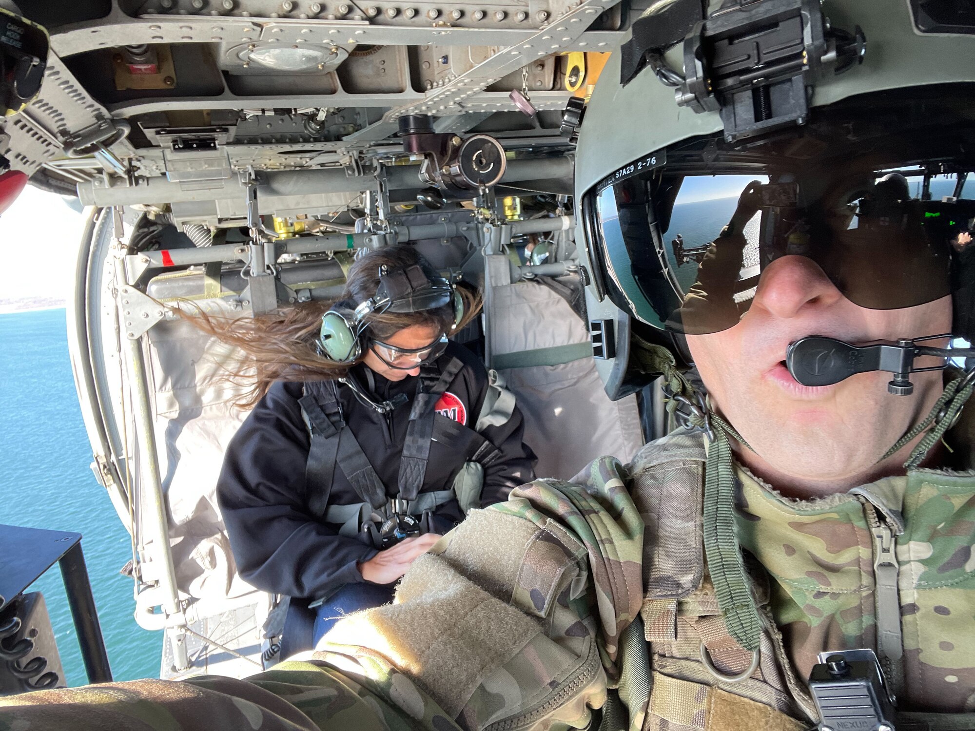 U.S. Air Force special mission aviator Tech. Sgt Patrick Williamson of the 106th Rescue Wing rides along guidance counselors from local schools near F.S. Gabreski Air National Guard Base in Westhampton Beach, N.Y. on Thursday Nov. 10.