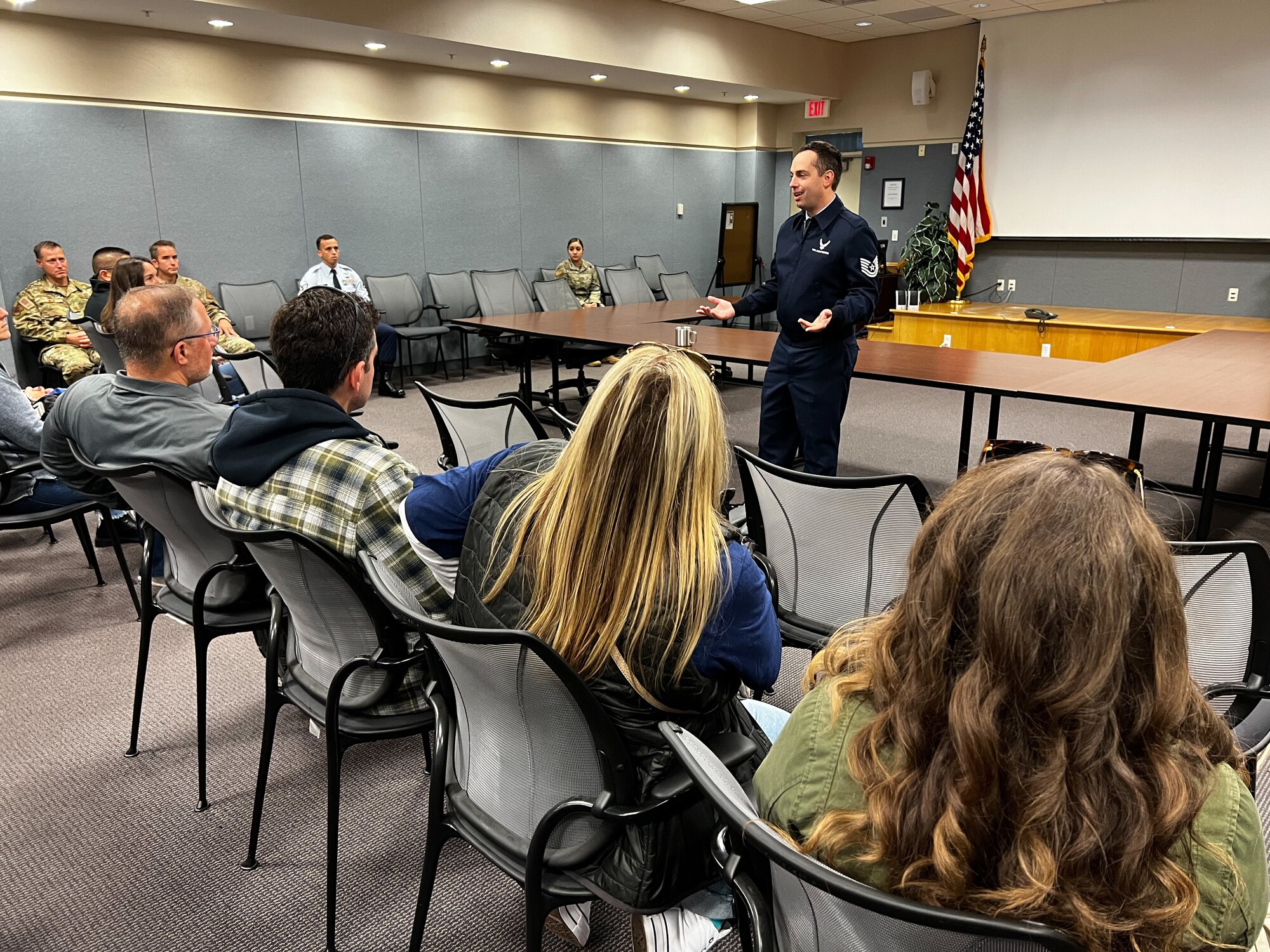 U.S. Air Force Tech Sgt. Joe Cacoperdo, Air National Guard recruiter, briefs a group of local high school guidance counselors about the mission and benefits of serving with the 106th Rescue Wing.