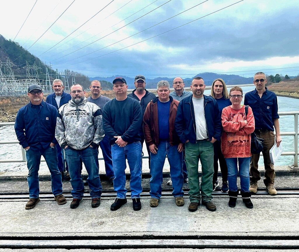 People standing on a deck.